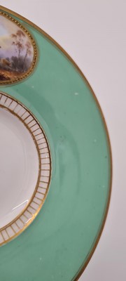 Lot 211 - A Royal Worcester porcelain cup and saucer