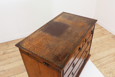 Lot 353 - A Queen Anne walnut kneehole desk