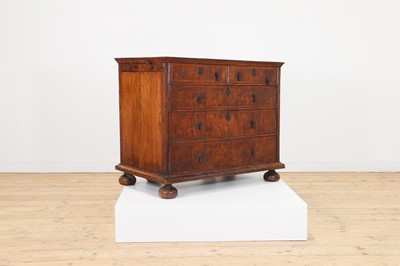 Lot 353 - A Queen Anne walnut kneehole desk