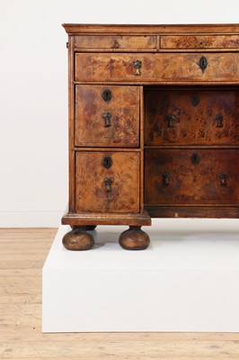 Lot 353 - A Queen Anne walnut kneehole desk