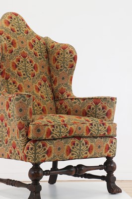 Lot 357 - A William and Mary-style walnut wingback armchair