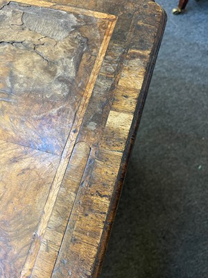 Lot 345 - A George I walnut and feather-banded architect's desk