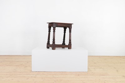 Lot 352 - An oak and walnut joint stool