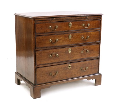 Lot 453 - A George III oak batchelor's chest