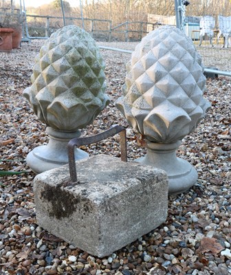 Lot 483 - A pair of Haddonstone pineapple pillar finials