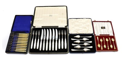 Lot 68 - A cased set of twelve French silver pickle or oyster forks