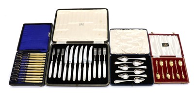 Lot 68 - A cased set of twelve French silver pickle or oyster forks