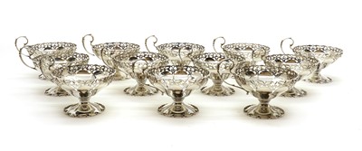 Lot 44 - A set of twelve silver footed dessert dishes