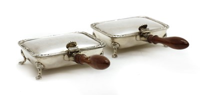 Lot 63 - A pair of silver warmers or silent butlers