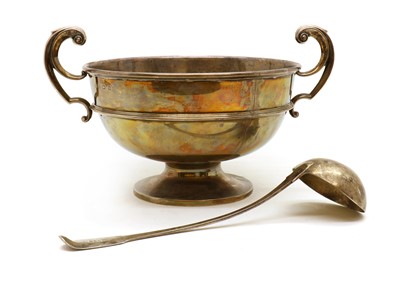 Lot 33 - A large twin handled silver presentation bowl