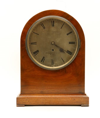 Lot 287 - A walnut domed bracket timepiece