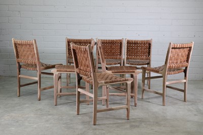 Lot 578 - A set of eight acacia wood and leather dining chairs