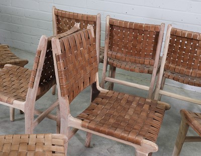 Lot 578 - A set of eight acacia wood and leather dining chairs