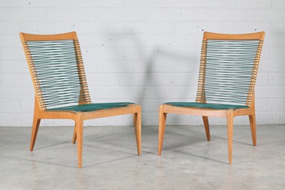Lot 226 - A pair of French birch lounge chairs