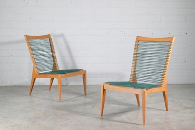 Lot 226 - A pair of French birch lounge chairs