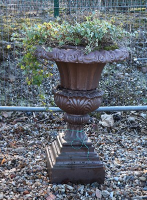 Lot 494 - A glazed stoneware garden urn and stand