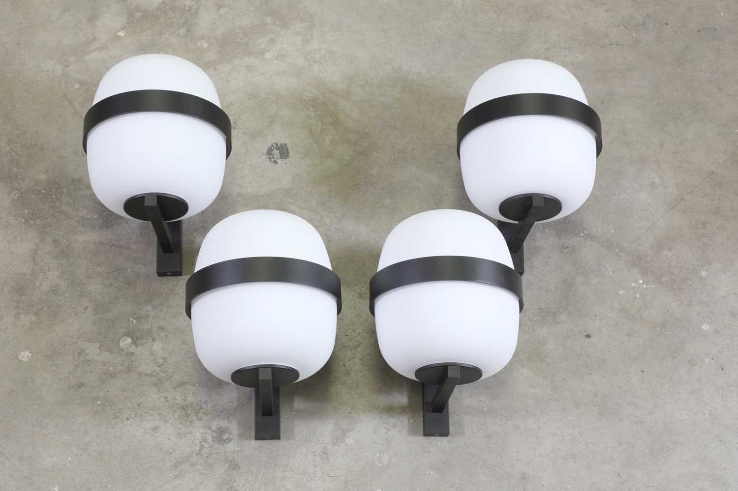 Lot 328 - A set of four 'Wally' wall lights