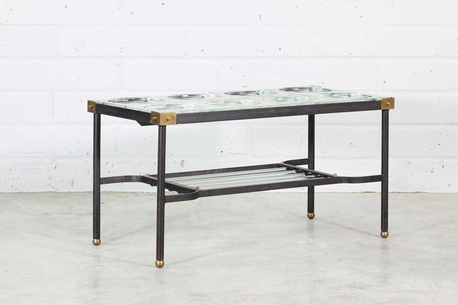 Lot 346 A wroughtiron and glasspanel coffee table,