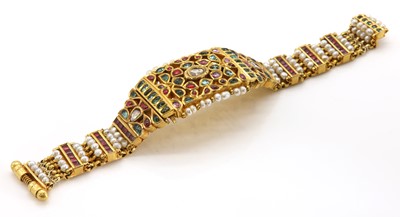 Lot 403 - An Indian high carat gold, diamond, pearl, foiled spinels and foiled emerald bracelet