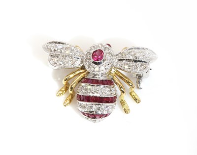 Lot 266 - A two colour gold, ruby and diamond bee brooch, retailed by Susannah Lovis