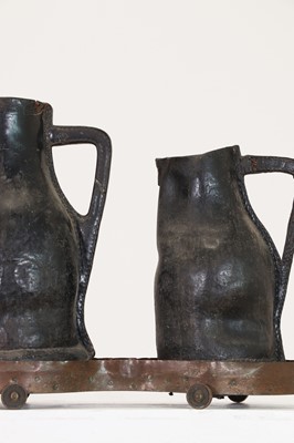 Lot 379 - Two large leather flagons or blackjacks