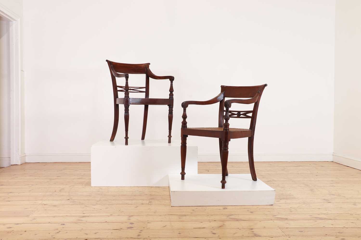 Lot 493 - A set of eight hardwood dining chairs