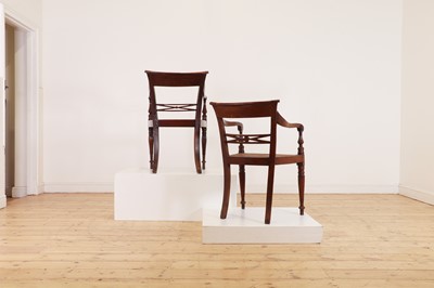 Lot 493 - A set of eight hardwood dining chairs