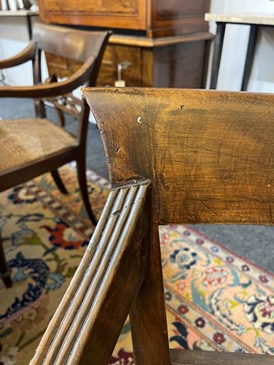 Lot 493 - A set of eight hardwood dining chairs