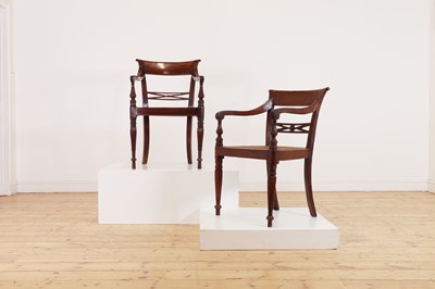 Lot 493 - A set of eight hardwood dining chairs