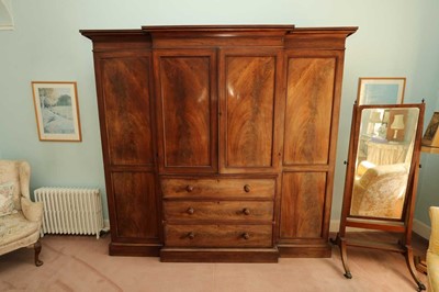 Lot 416 - A mahogany breakfront wardrobe