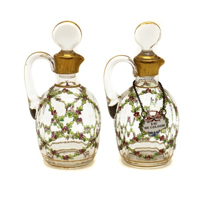 Lot 148 - A pair of painted glass dressing table bottles and stoppers