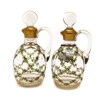 Lot 148 - A pair of painted glass dressing table bottles and stoppers