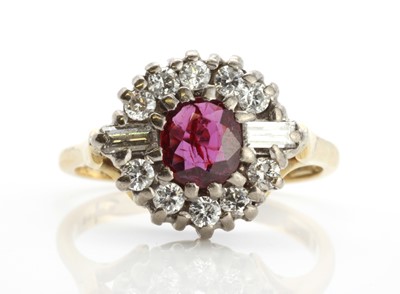 Lot 269 - An 18ct gold ruby and diamond cluster ring