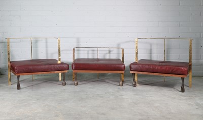 Lot 612 - A pair of South African 'Little Miss Fat' brass lounge chairs
