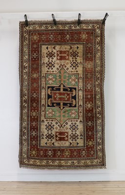 Lot 333 - A Kazak carpet