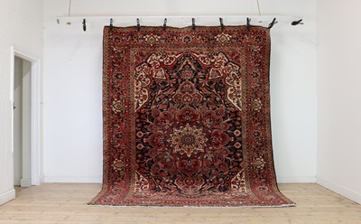 Lot 340 - A Heriz carpet