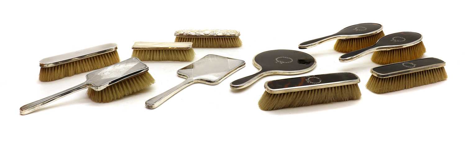 Lot 77 - A collection of silver mounted dressing table items