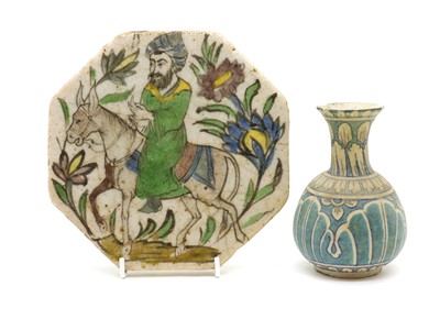 Lot 108 - A Qajar pottery tile
