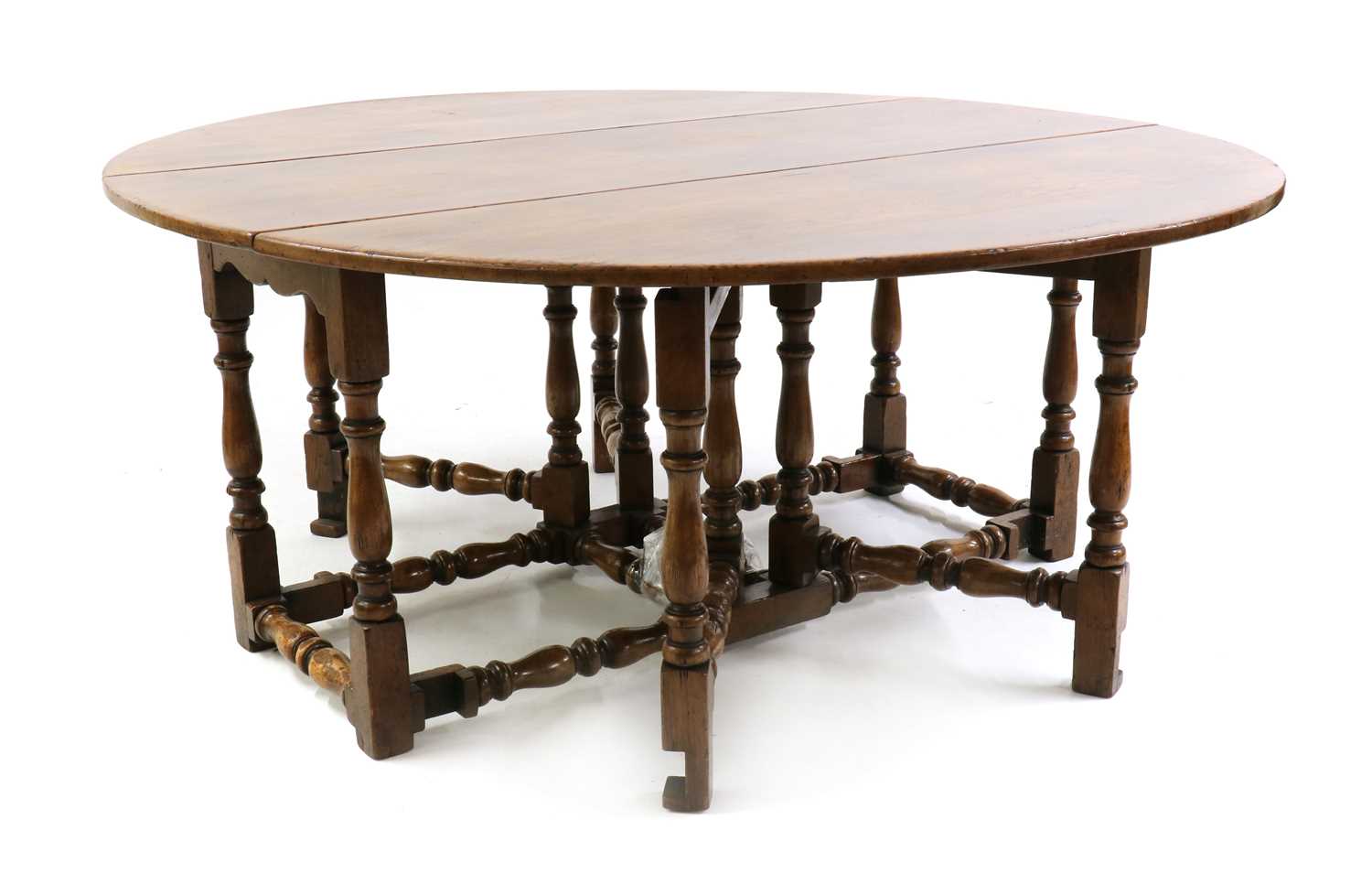 Lot 460 - An old reproduction oak gateleg table