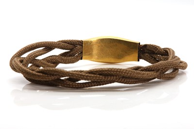 Lot 59 - A Victorian plaited hair bracelet