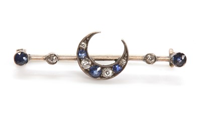 Lot 86 - A late Victorian sapphire and diamond crescent brooch c.1890