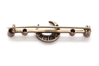 Lot 86 - A late Victorian sapphire and diamond crescent brooch c.1890