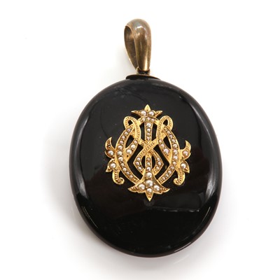 Lot 46 - A Victorian onyx and split pearl memorial picture locket, c.1880