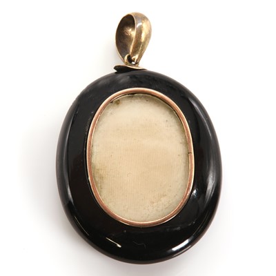 Lot 46 - A Victorian onyx and split pearl memorial picture locket, c.1880