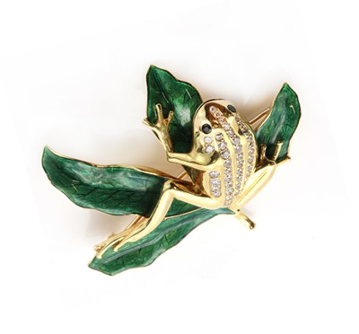 Lot 211 - An 18ct gold diamond, emerald and enamel frog brooch, by