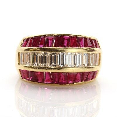 Lot 86 - A Continental diamond and ruby half hoop ring