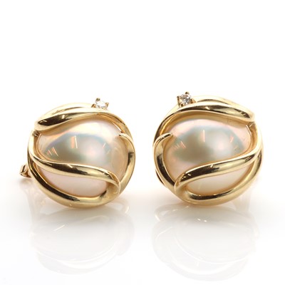 Lot 238 - A pair of Continental cultured mabé pearl and diamond clip earrings