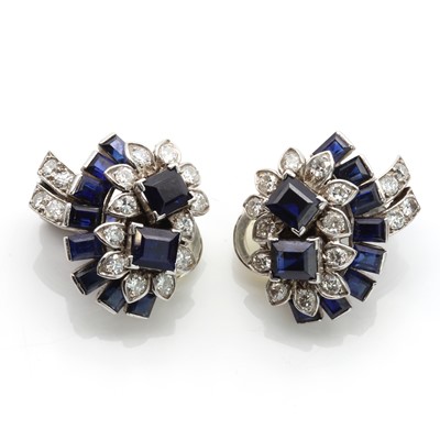 Lot 180 - A pair of sapphire and diamond spray style clip earrings