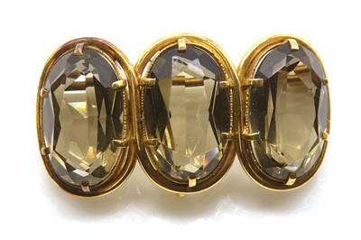 Lot 16 - A Victorian three stone Cairngorm brooch