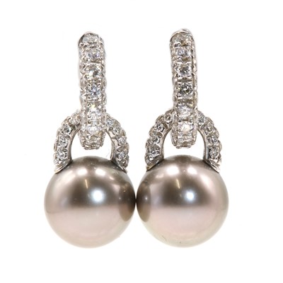 Lot 229 - A pair of Tahitian cultured pearl and diamond earrings, by Mikimoto